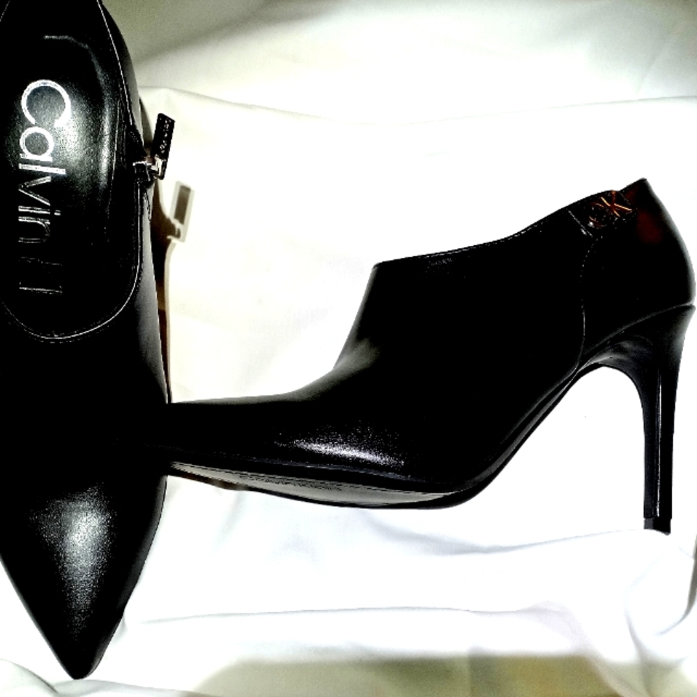Calvin Klein, size 10 black high heeled booties